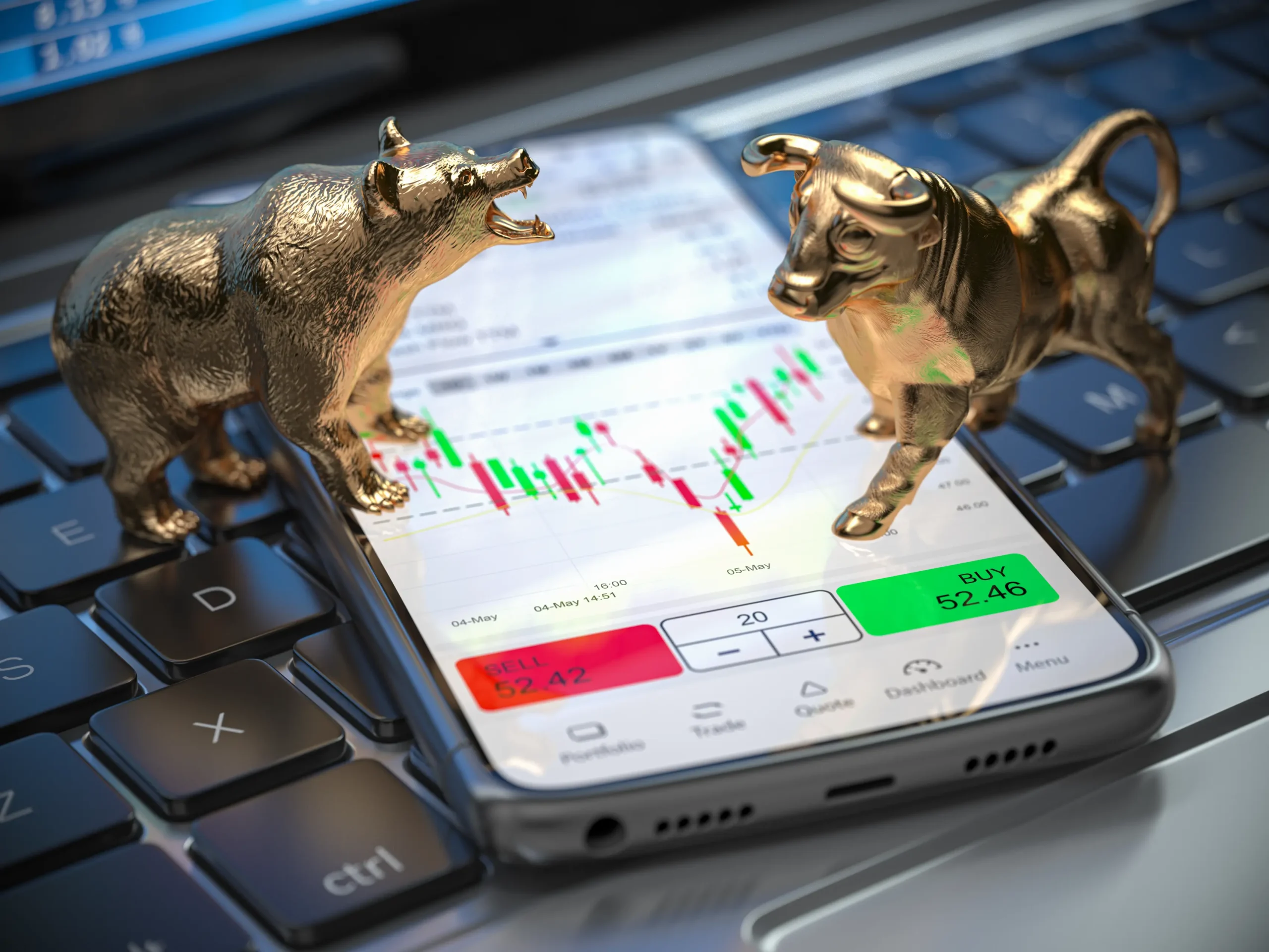 Bulle und Bär in Gold als Zeichen für steigende und fallende Börsenkurse